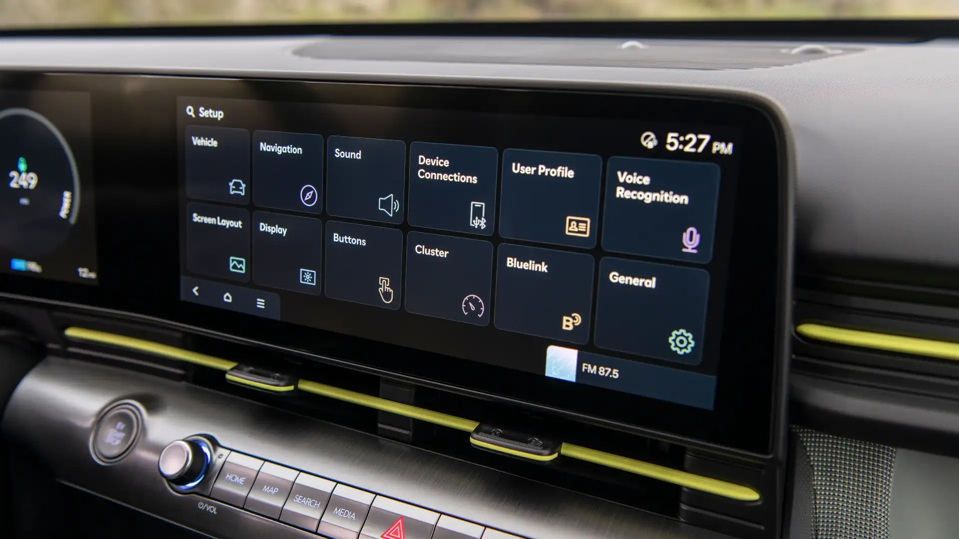 2026 Hyundai Kona Electric interior touchscreen showing vehicle settings, navigation, connectivity, and digital interface.