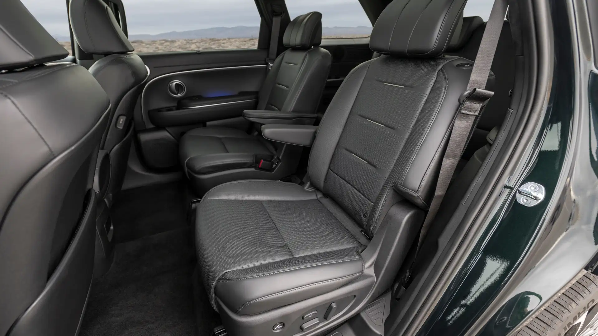 2026 Hyundai Palisade second-row captain’s chairs with leather upholstery, spacious legroom, and refined interior styling.