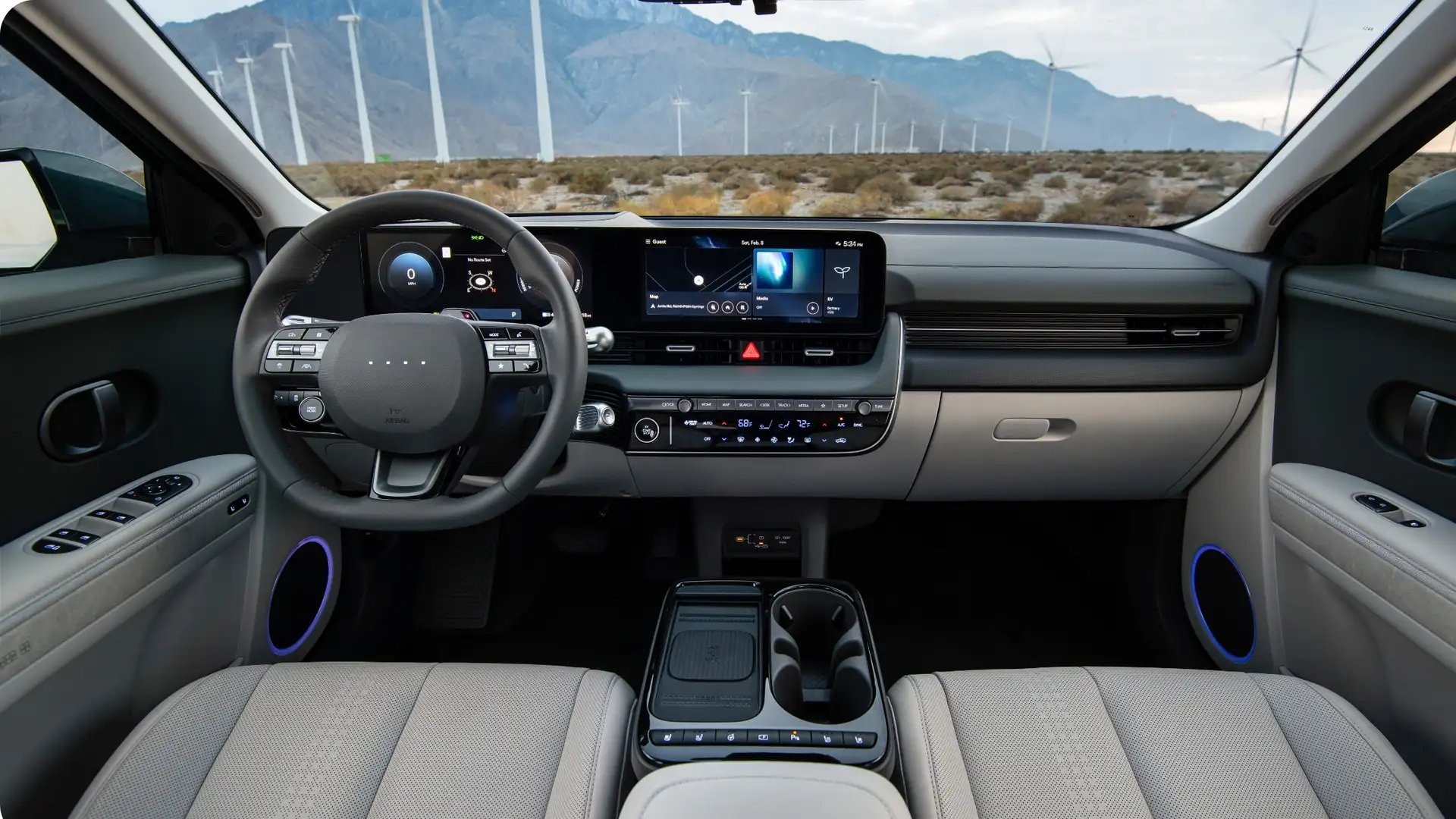 2026 Hyundai IONIQ 5 interior with dual screens, modern dashboard layout, ambient lighting, and open cabin.