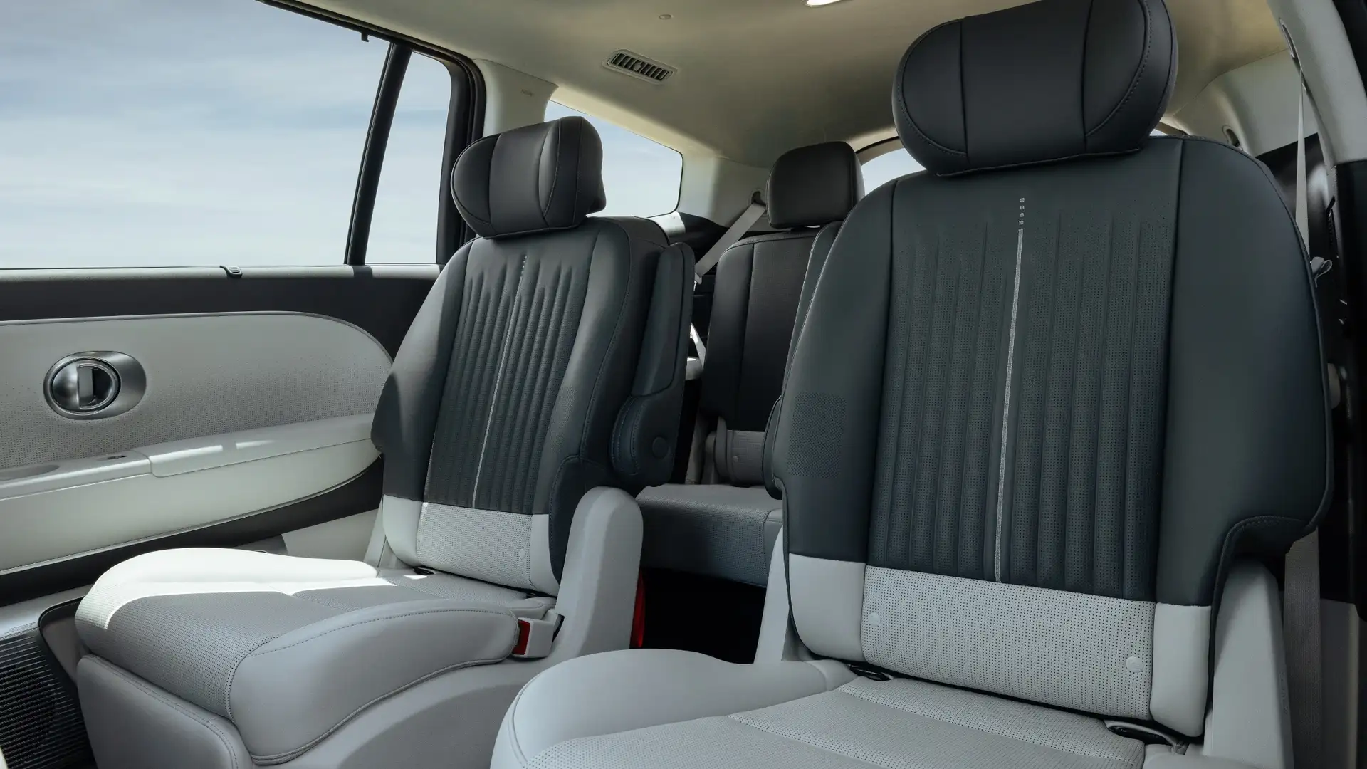 Second row captain’s chairs inside the 2026 Hyundai IONIQ 9 showing spacious legroom and modern seating design.
