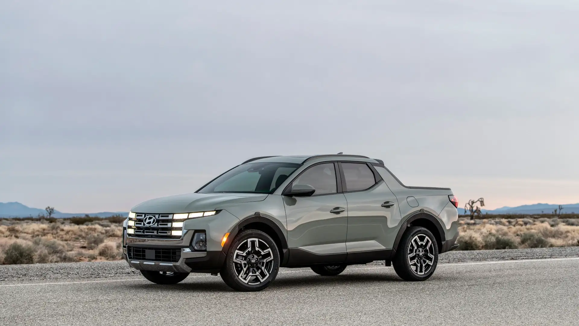2026 Hyundai Santa Cruz compact pickup truck side view highlighting rugged styling and versatile bed design.
