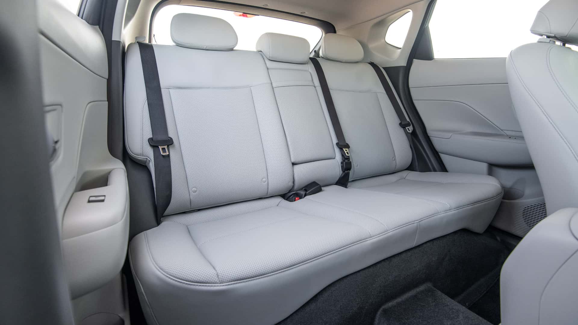 2026 Hyundai Kona rear seating area with light upholstery and spacious passenger seating.