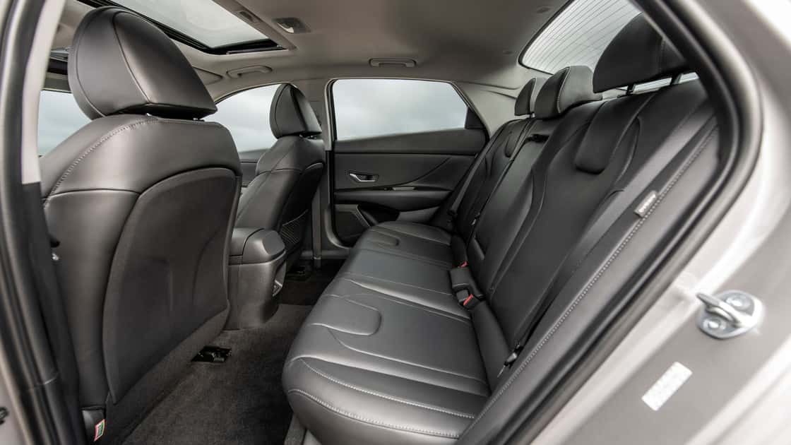Image highlighting black and gray rear seating with headrests and seatbelts in 2026 Hyundai Elantra.