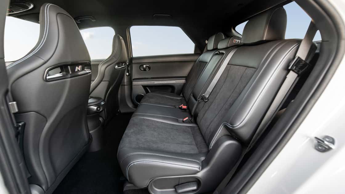 2026 Hyundai IONIQ 5 N rear seats with black sport upholstery, contrast stitching, and spacious passenger cabin layout.