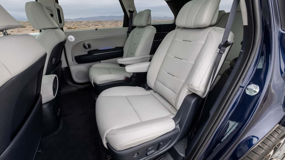 2027 Hyundai Palisade second-row seating with light upholstery, armrests, and spacious passenger room.