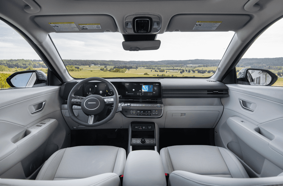 Wide-angle view of the 2025 Hyundai Kona’s tech-focused front cabin and digital cockpit