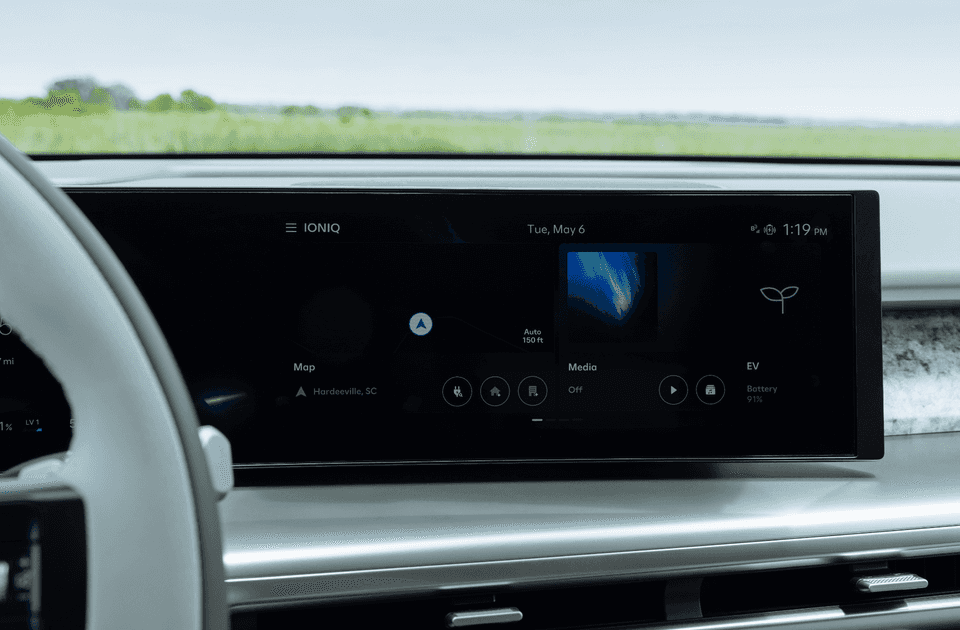 Close-up of 2026 Hyundai IONIQ 9 digital display showing EV battery status and navigation features.