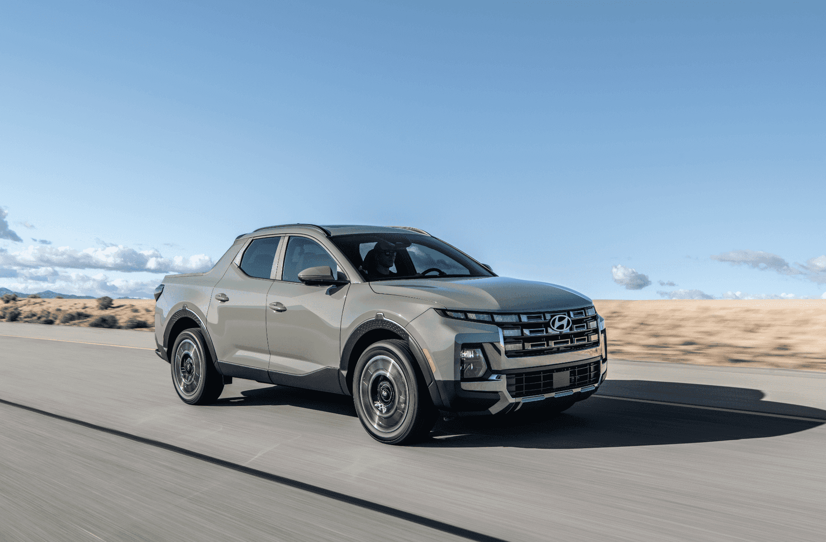 2026 Hyundai Santa Cruz cruising on an open road.