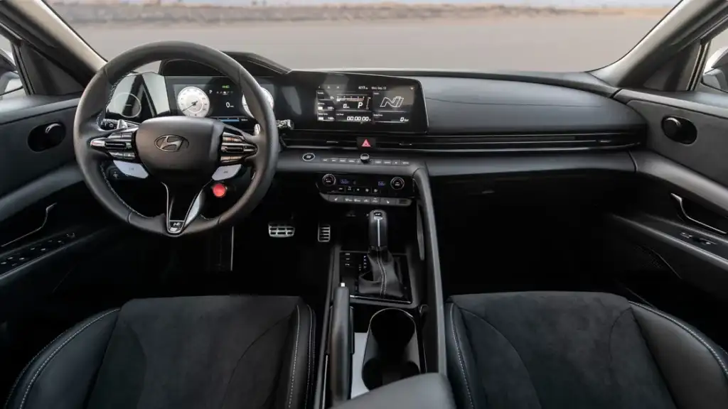 Driver-focused cockpit of the 2026 Hyundai Elantra N with performance displays and sporty steering wheel.