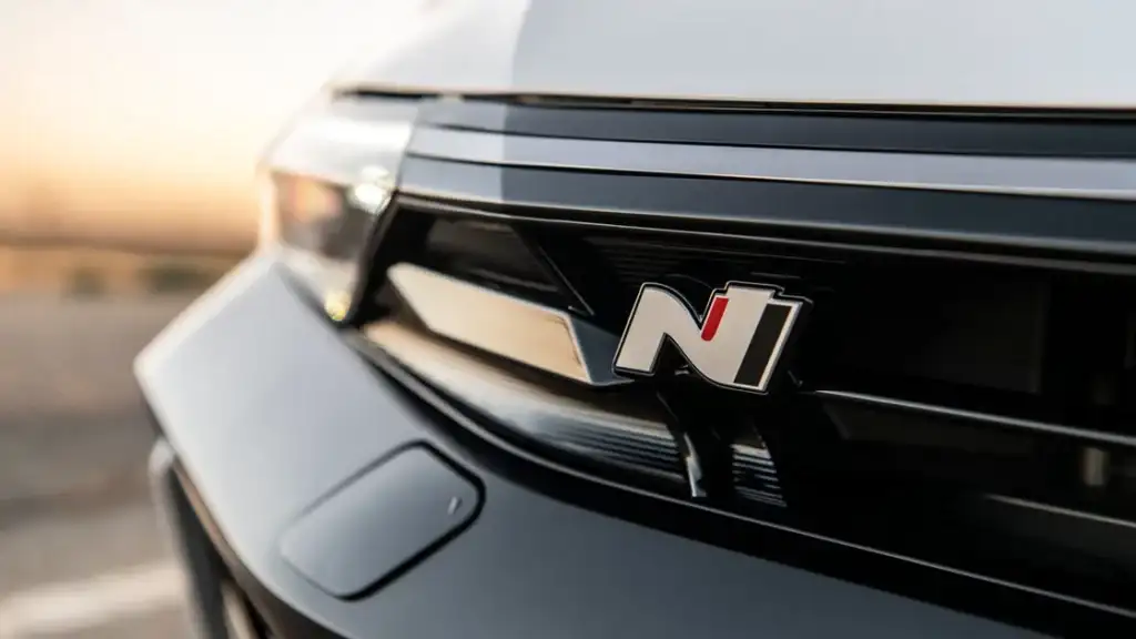 Close-up of the 2026 Hyundai Elantra N grille featuring the N badge and sporty front-end detailing.