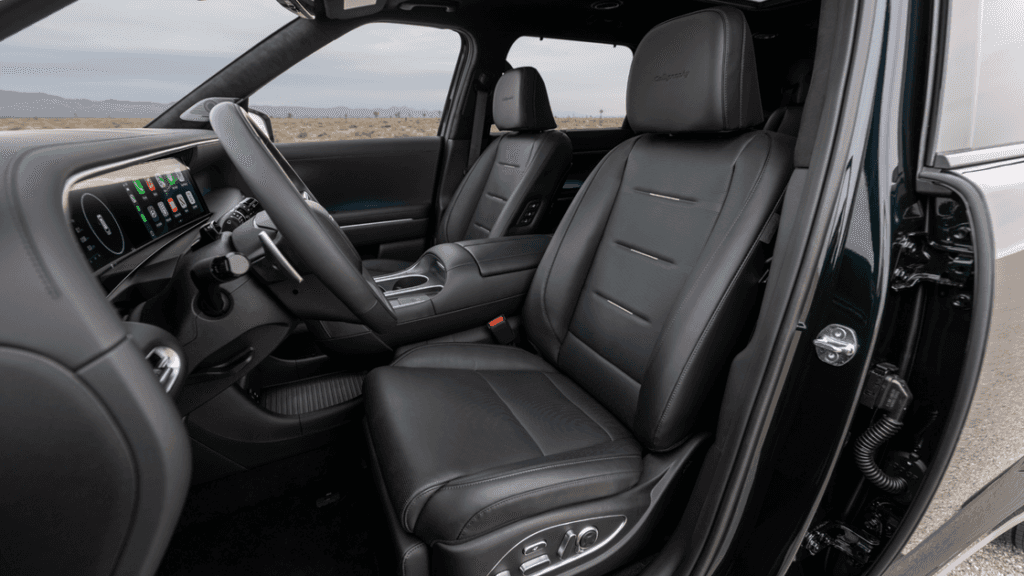 2026 Hyundai Palisade black leather front interior with digital display and driver cockpit.