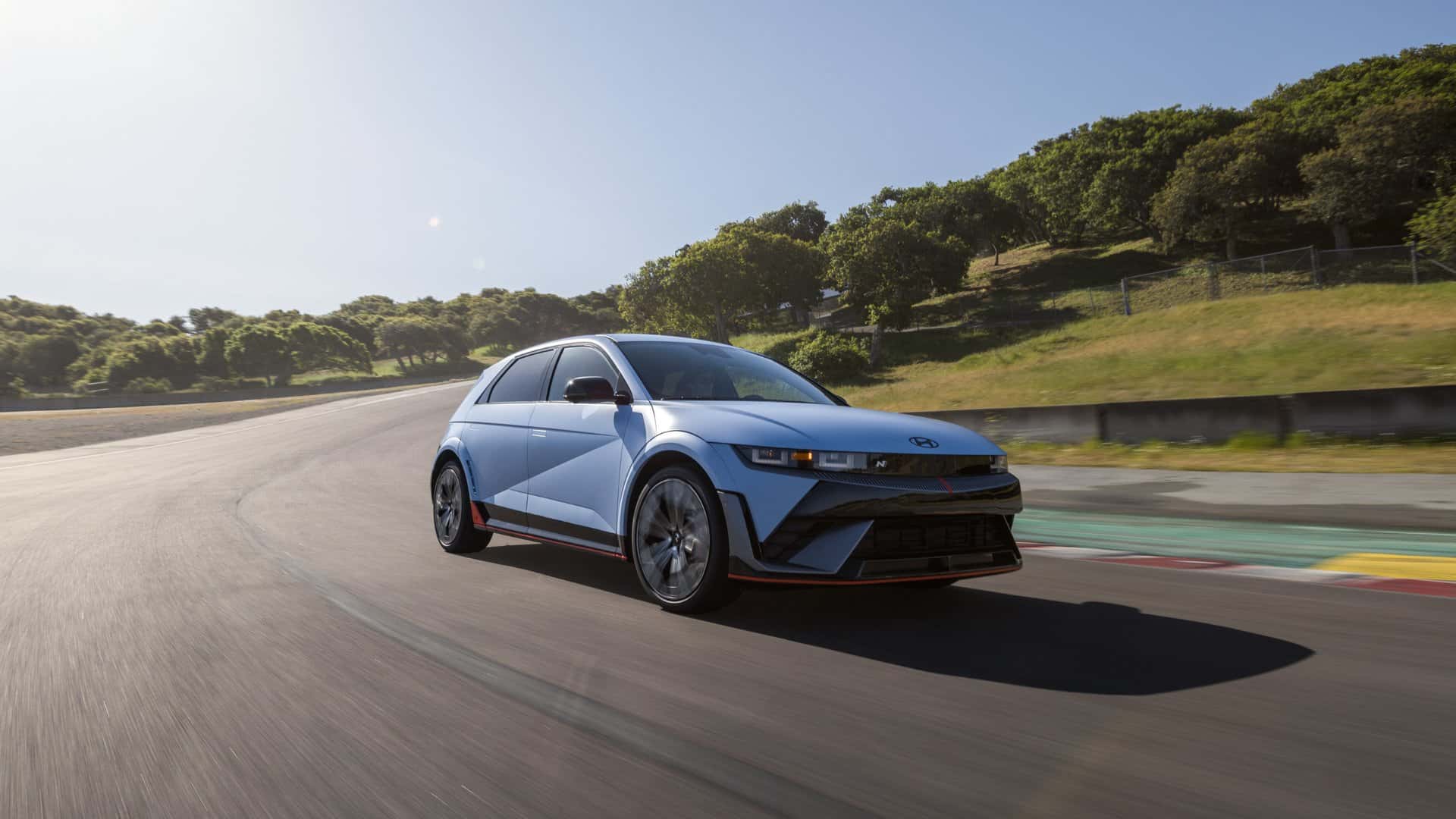 2026 Hyundai IONIQ 5 N performance electric hatchback in motion on track showcasing sporty design and aerodynamic handling.