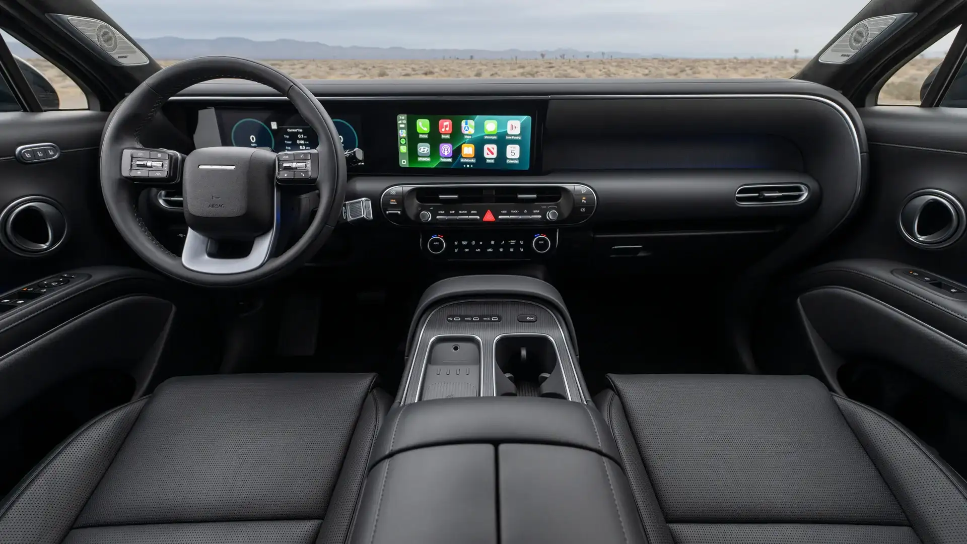 2026 Hyundai Palisade black interior with digital display, steering wheel, and center console.