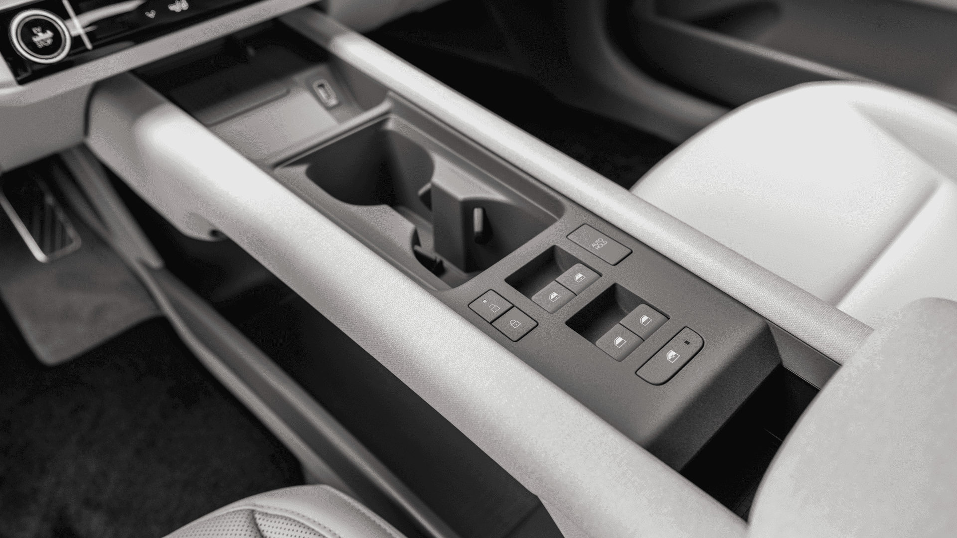 Interior view of the 2025 Hyundai IONIQ 6 featuring a minimalist steering wheel and dual screens