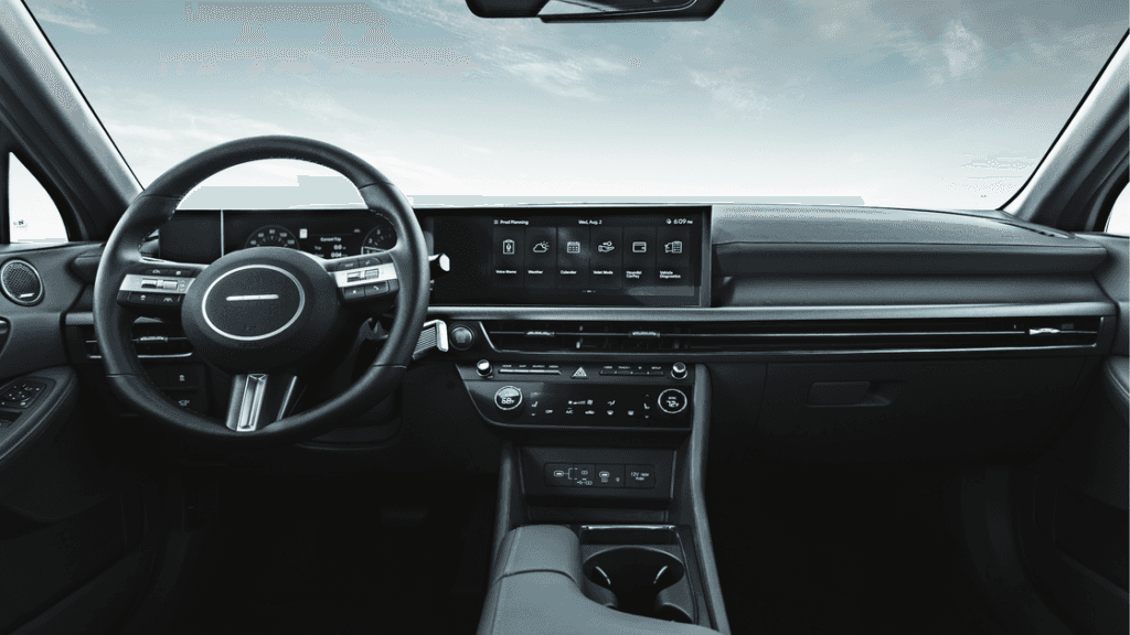 2025 Hyundai Sonata Hybrid interior with touchscreen interface and dual-zone climate control.