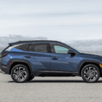 2025 Hyundai Tucson showcasing sleek exterior design and black cladding accents.