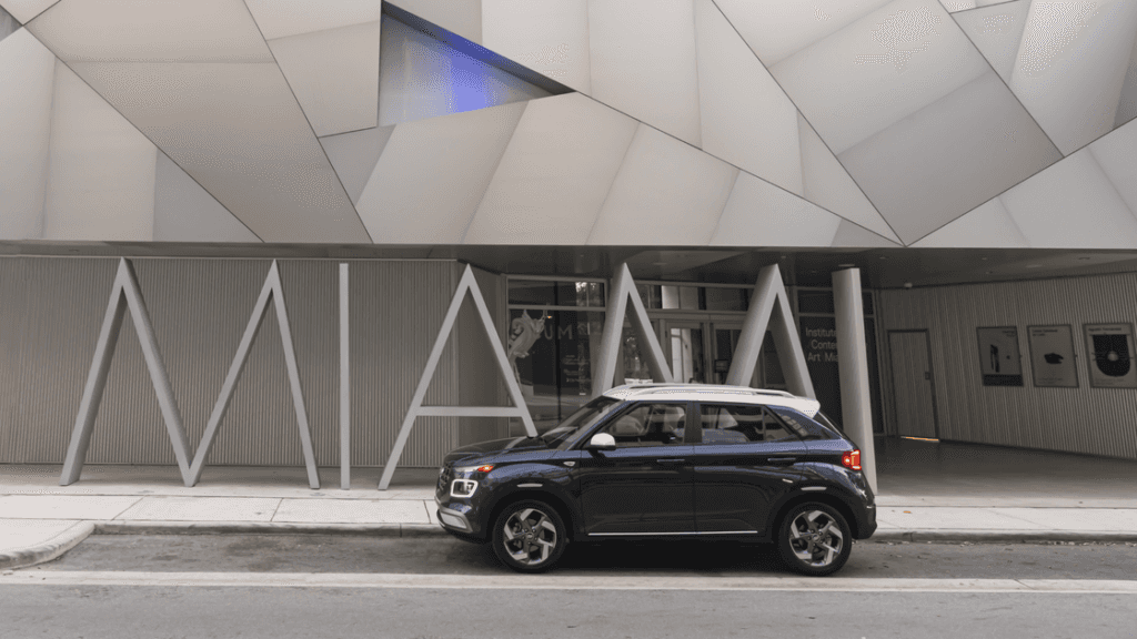 2025 Hyundai Venue parked in front of modern art building with MIA sign in Miami.