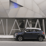 2025 Hyundai Venue parked in front of modern art building with MIA sign in Miami.