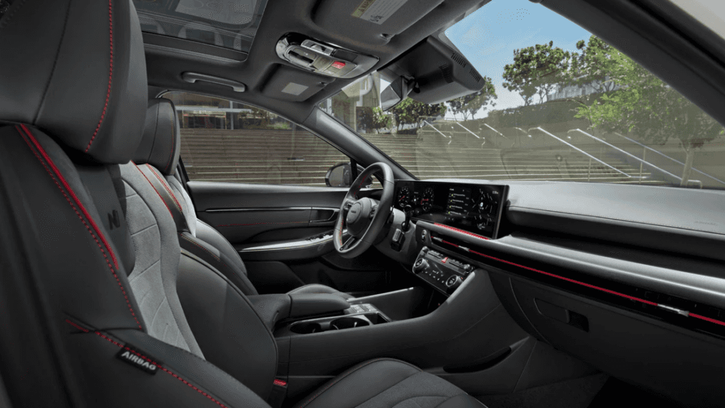 2025 Hyundai Sonata N Line interior featuring leather sport seats with red stitching and dual display.