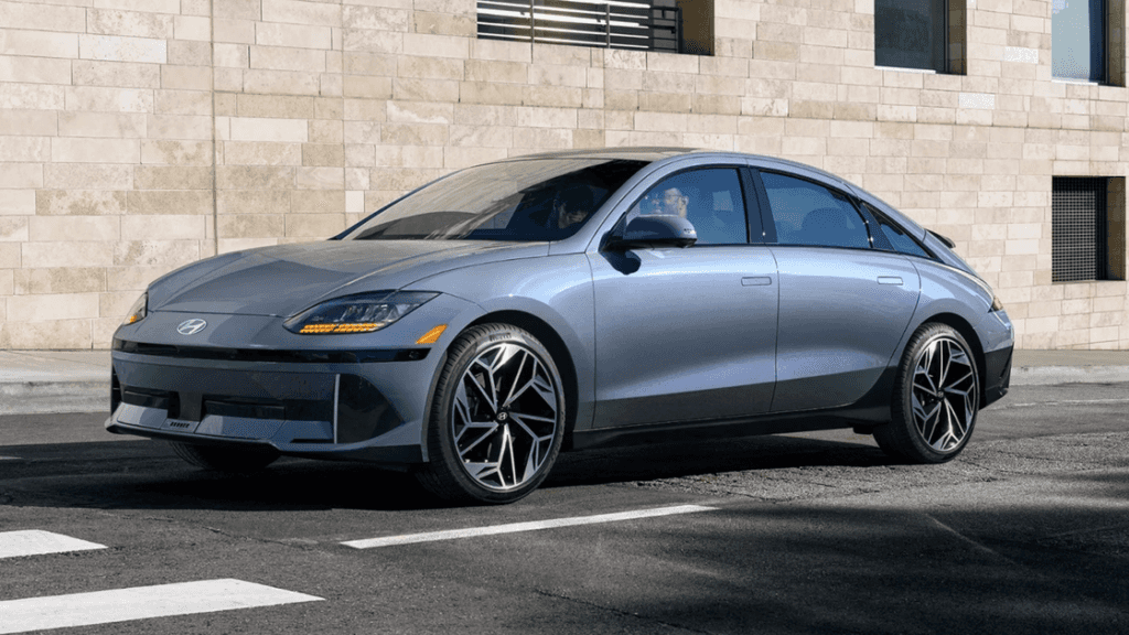 Side angle of 2025 Hyundai IONIQ 6 in metallic gray with sleek aerodynamic design and alloy wheels.
