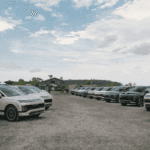2026 Hyundai IONIQ 9 lineup displayed outdoors in multiple colors, including white, green, and blue, showcasing the electric SUV’s modern front fascia and sleek aerodynamic design.