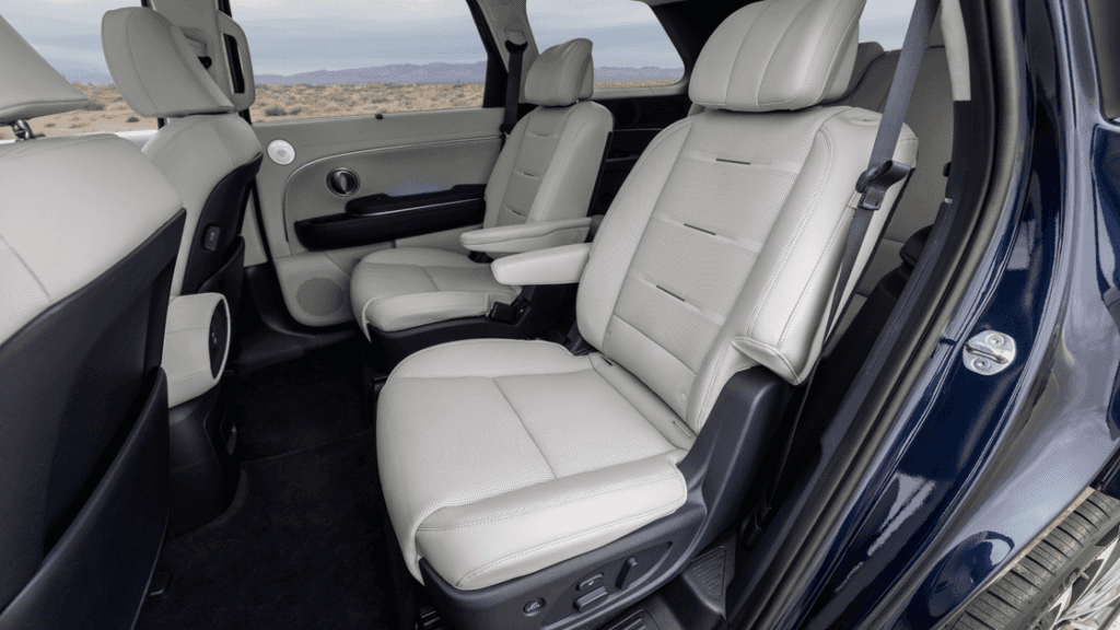 Second-row captain’s chairs in 2026 Hyundai Palisade with light leather upholstery and armrests.