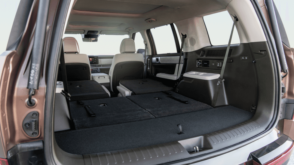 2026 Hyundai Santa Fe Hybrid rear cargo space with seats folded flat for expanded storage capacity.