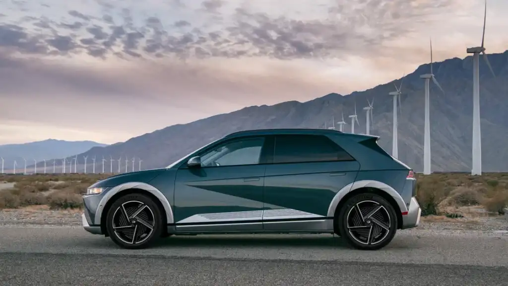 Side profile of the 2025 Hyundai IONIQ 5 electric SUV highlighting aerodynamic design and alloy wheels.