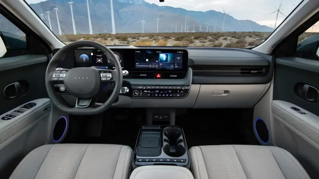 Interior cockpit of the 2025 Hyundai IONIQ 5 showing digital displays and modern eco-friendly materials.