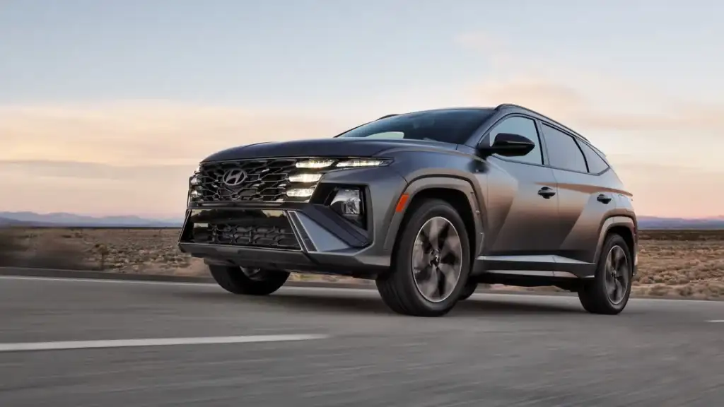Front exterior of the 2025 Hyundai Tucson SUV emphasizing aerodynamic lines and signature LED grille.