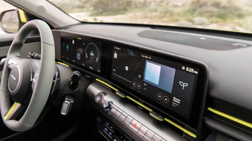 Dashboard of 2026 Hyundai Kona Electric highlighting dual digital displays and infotainment unit.