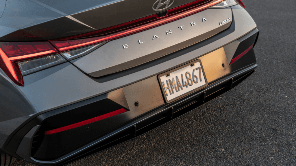 2026 Hyundai Elantra rear exterior detail with full-width taillight bar and Elantra badging.