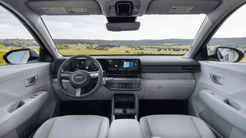 2026 Hyundai Kona interior dashboard with digital display, steering wheel, and modern cabin layout.
