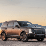 2026 Hyundai Palisade SUV parked at sunset highlighting rugged stance and premium exterior details.