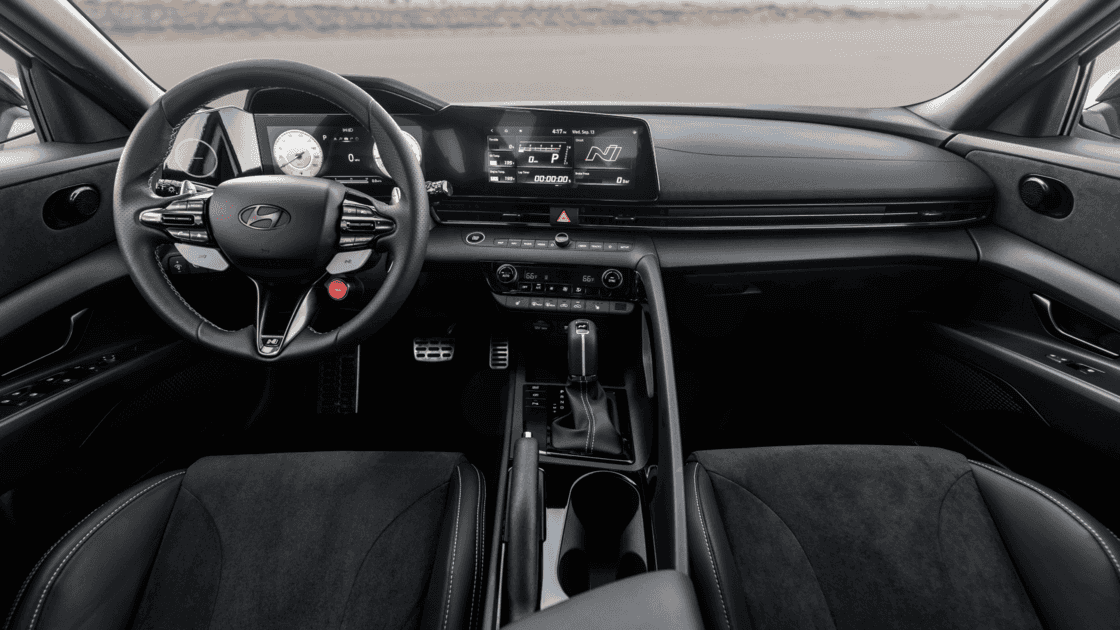 Interior cockpit view of the 2026 Hyundai Elantra N featuring digital gauge cluster, performance steering wheel, and modern dashboard layout.