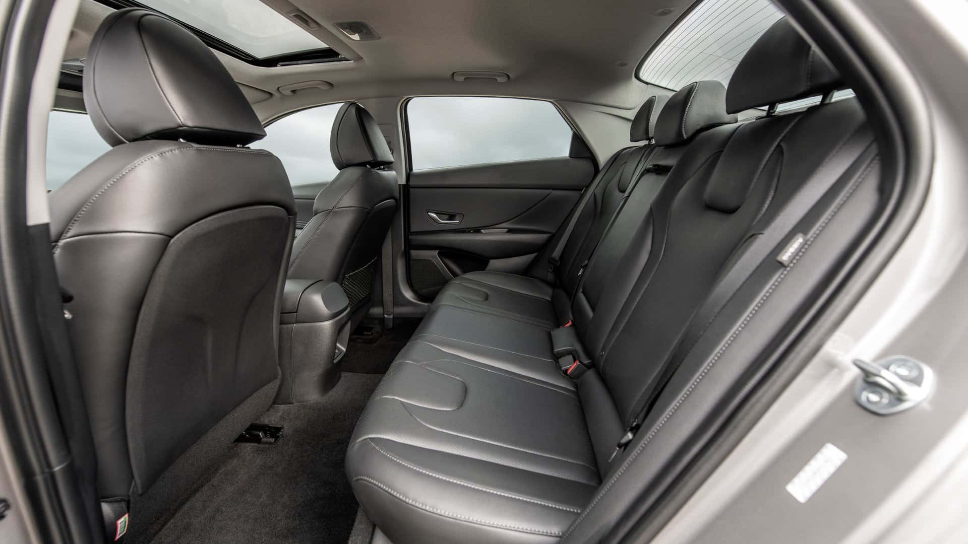2026 Hyundai Elantra rear seat interior with black upholstery and spacious second row seating.
