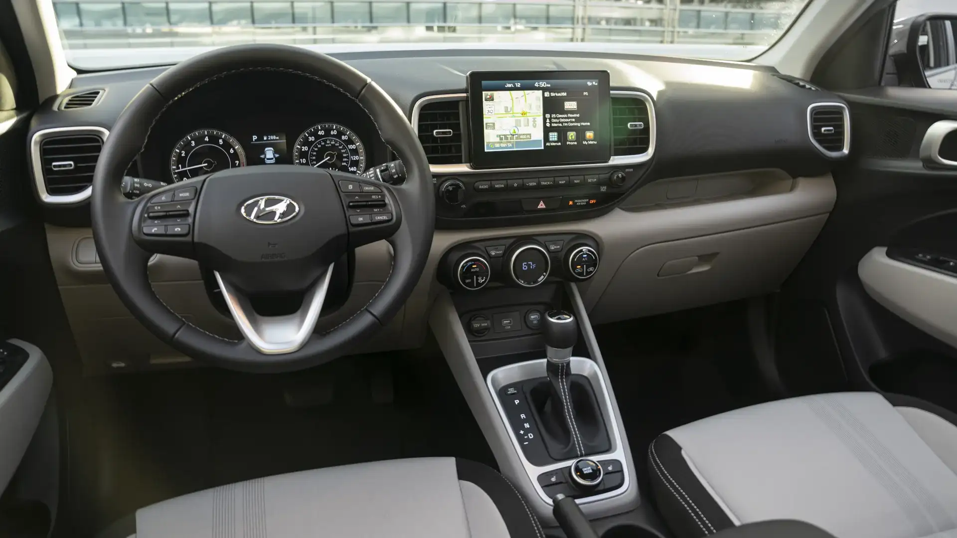 2026 Hyundai Venue dashboard with touchscreen navigation, climate controls, and steering wheel.