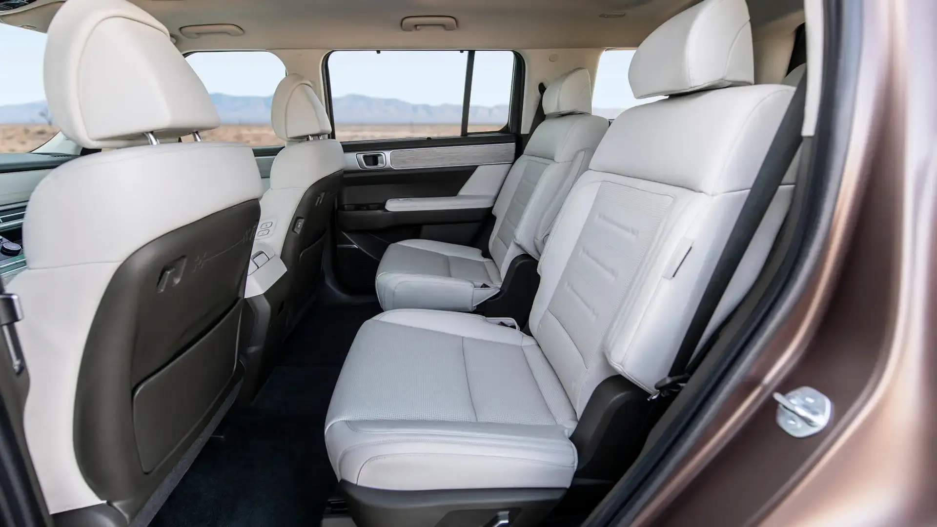 2026 Hyundai Santa Fe Hybrid second row seating with light upholstery and spacious rear cabin.