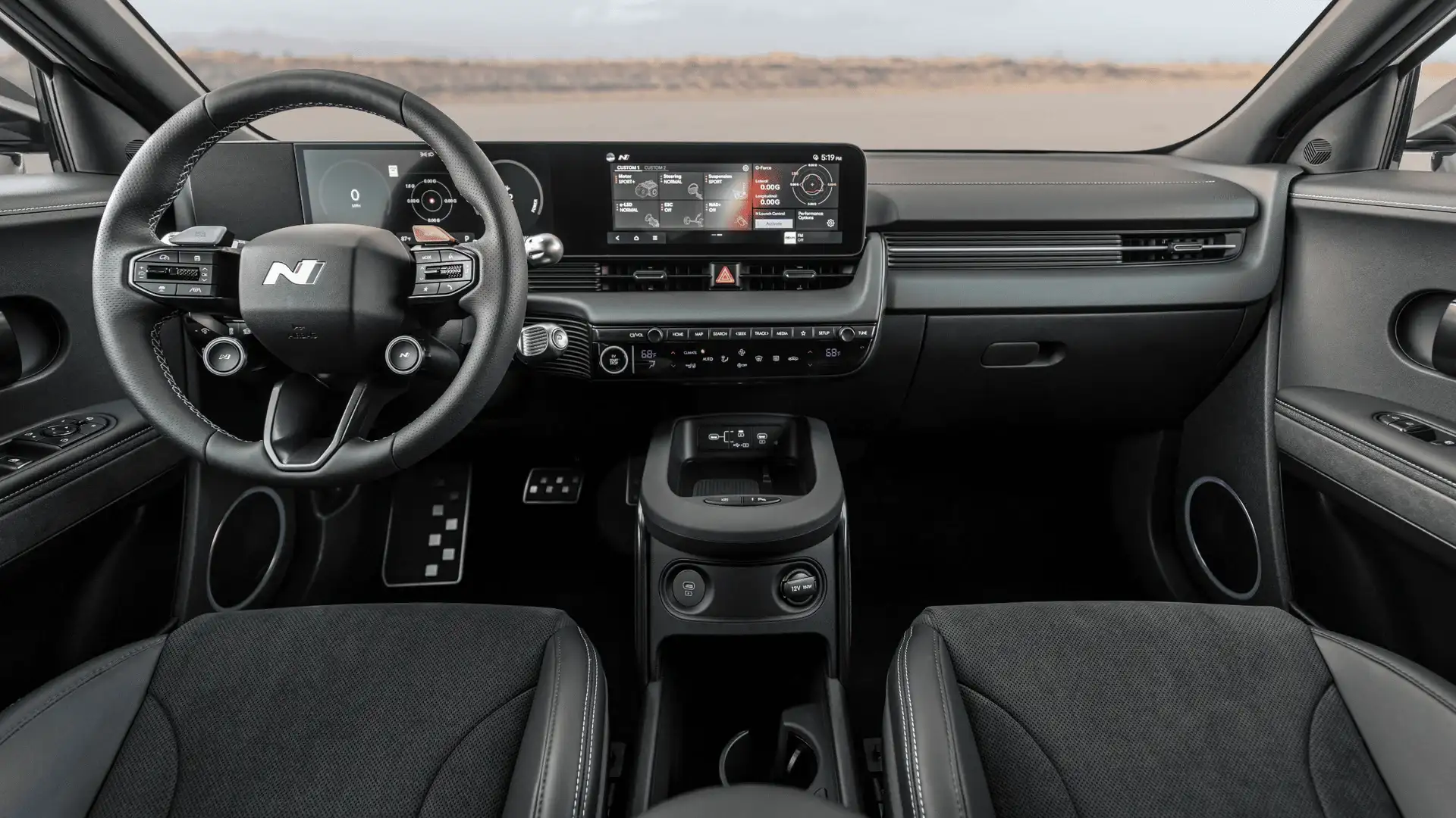 2026 Hyundai IONIQ 5 N interior with black dashboard, N steering wheel, and sport display.