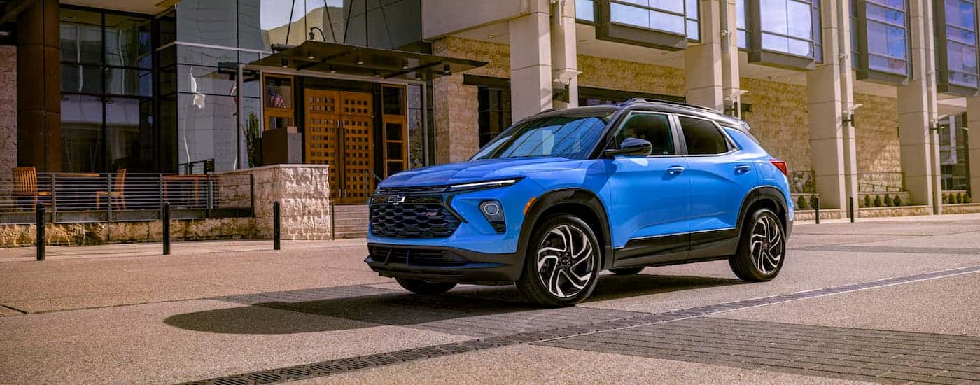 A blue 2025 Chevy Trailblazer RS is shown from the side.