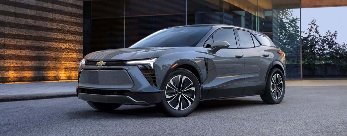 A grey 2024 Chevy Blazer EV is shown at a Chevy dealer near Dover.