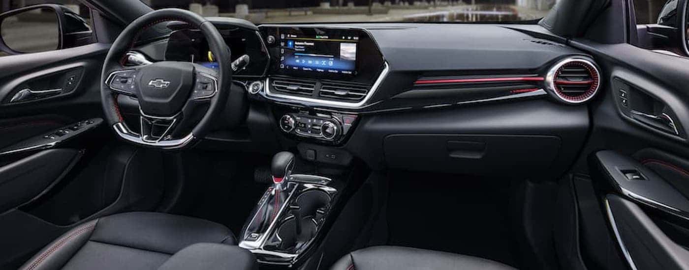 The black interior of a 2025 Chevy Trax.