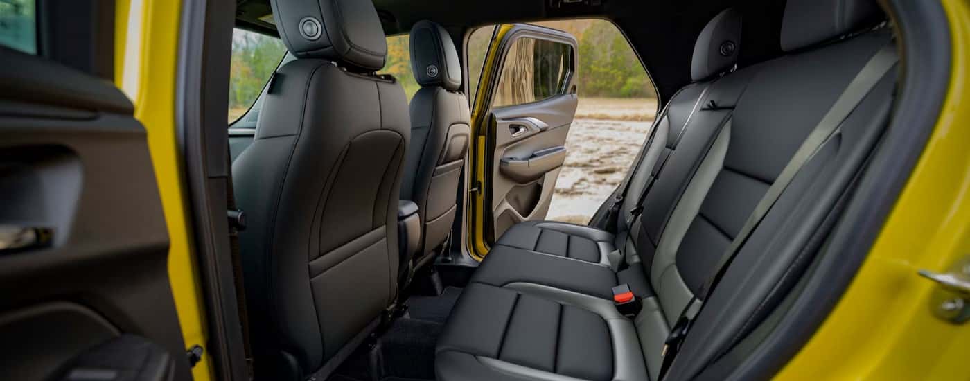 The gray rear interior in a yellow 2025 Chevy Trailblazer.