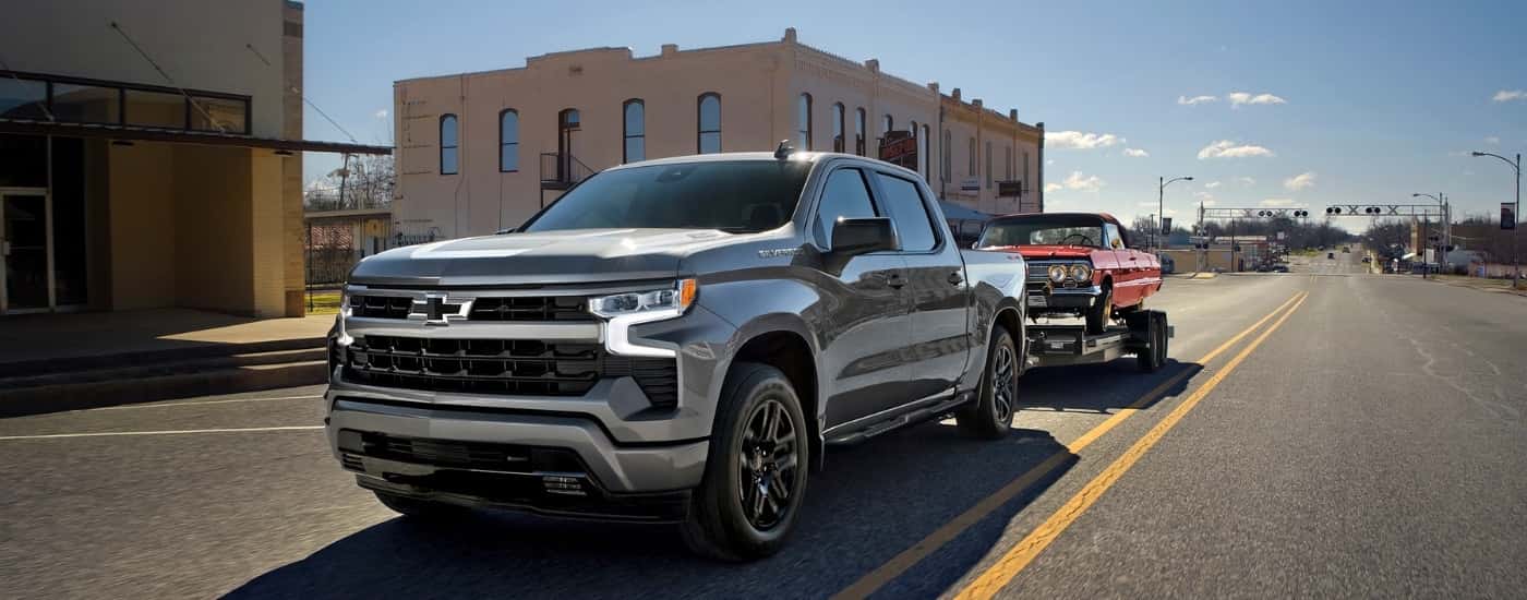 A silver 2026 Chevy Silverado 1500 for sale near Manchester from the front at an angle.