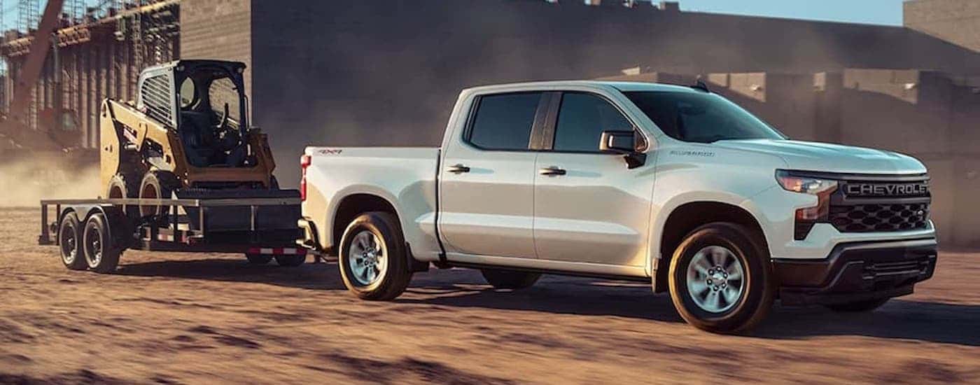 A white 2025 Chevy Silverado 1500 for sale near Newton from the side.