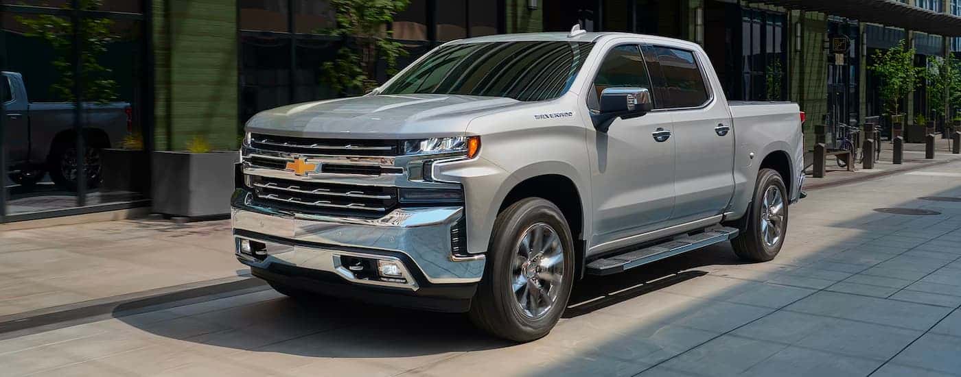 Silver 2019 Chevy Silverado 1500 parallel parked