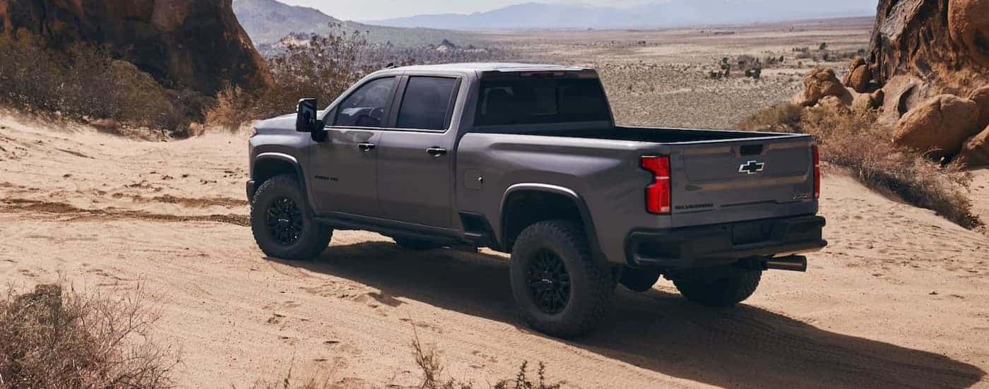 A gray 2025 Chevy Silverado 2500 ZR2 parked off-road.