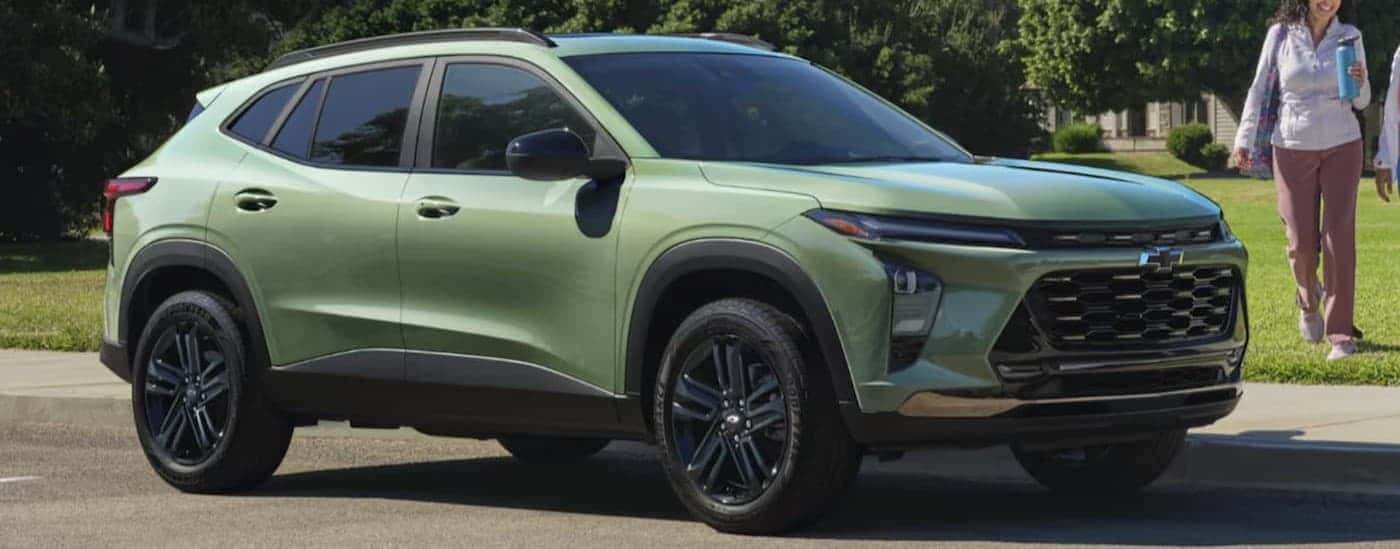 A parked green 2025 Chevy Trax ACTIV for sale near Dover.