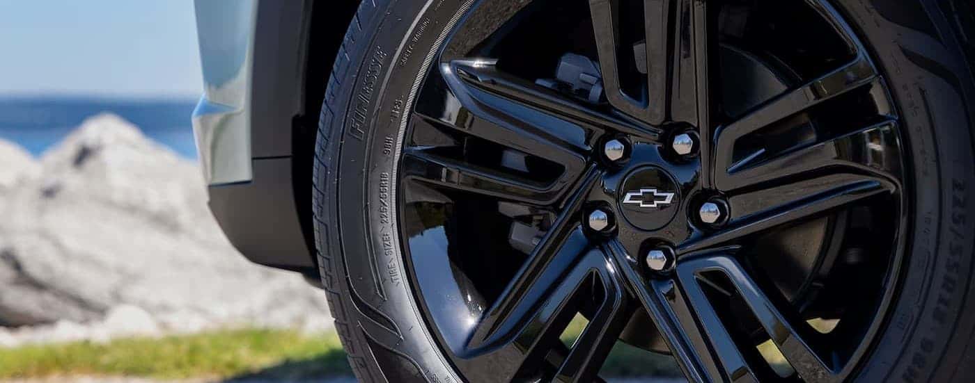 Close-up of the wheel on a green 2025 Chevy Trax ACTIV for sale near Seabrook.