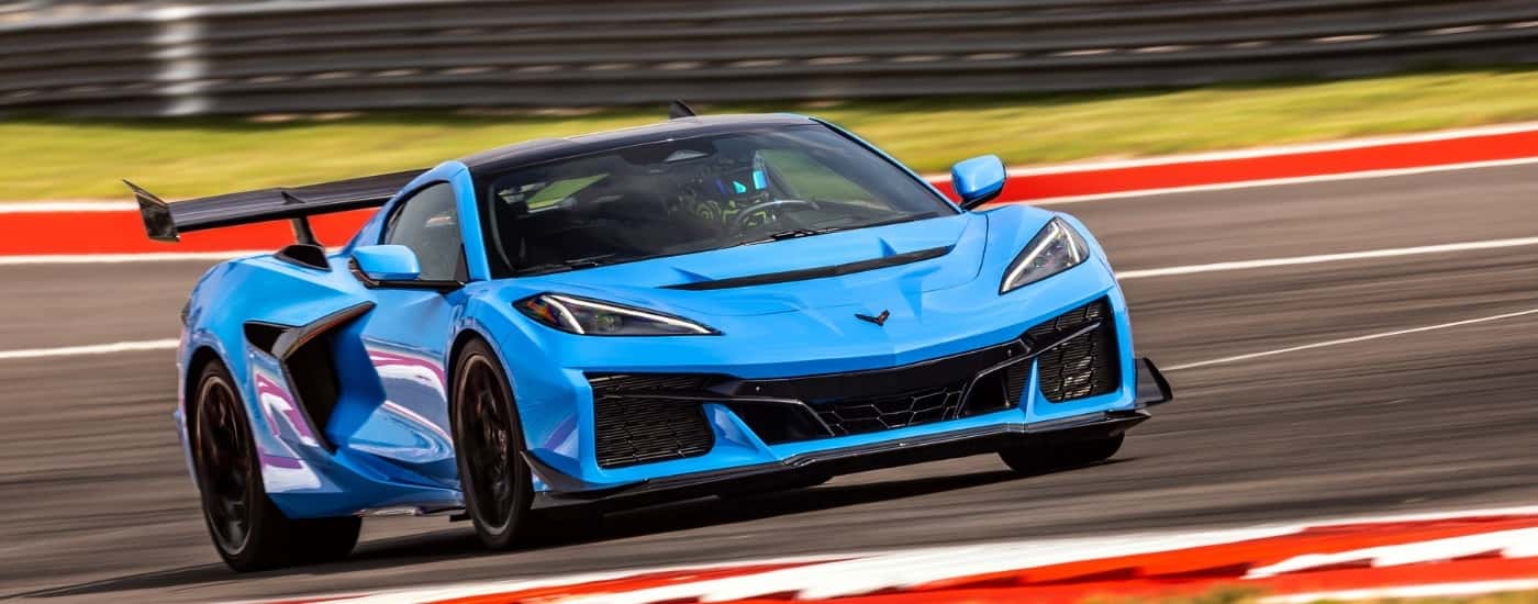 A blue 2026 Chevy Corvette from the front.